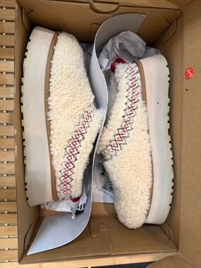 UGG Cream Sherpa Platform Slip-On Shoes with Red and Black Stitching